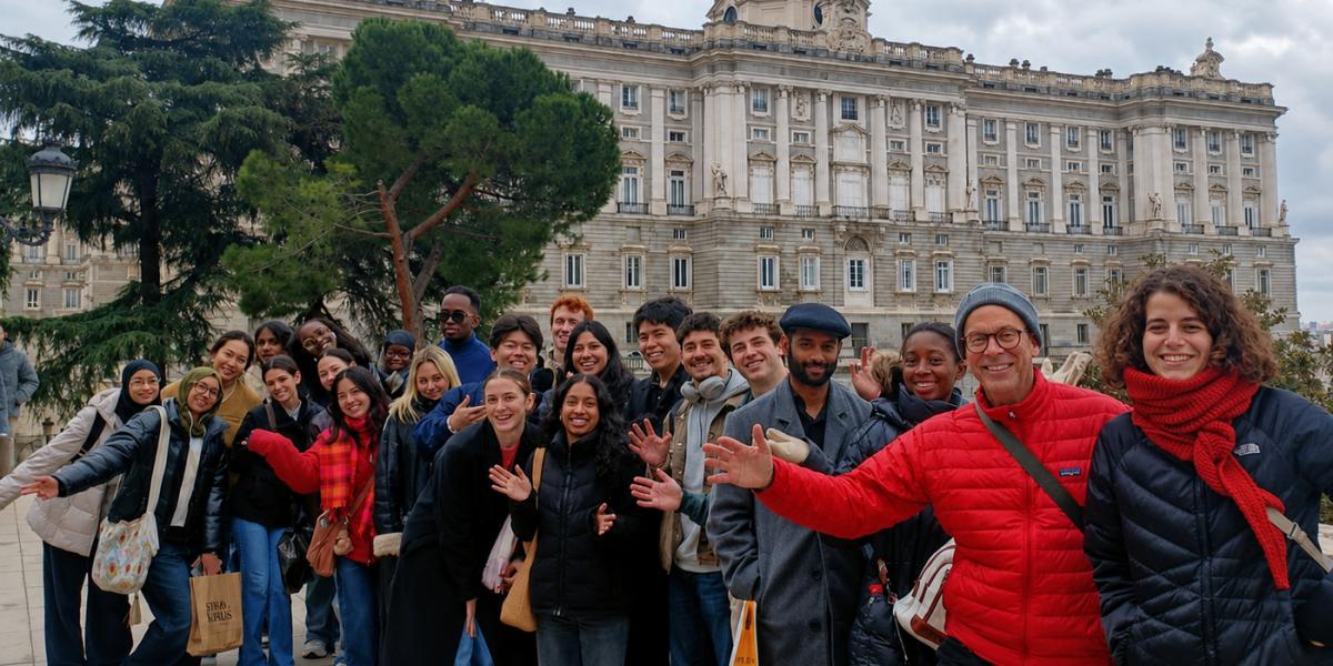 BMGT469E students and instructors gather in front of a historic palace in Spain during a study abroad course focused on innovation, design, and cross-cultural learning.